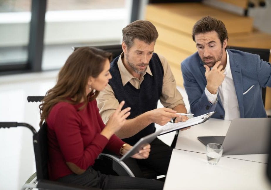 business-team-reviewing-documents-together