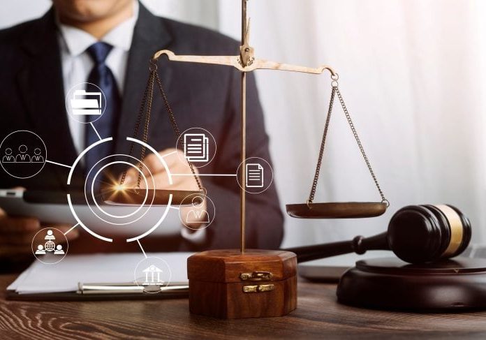 Business,And,Lawyers,Discussing,Contract,Papers,With,Brass,Scale,On